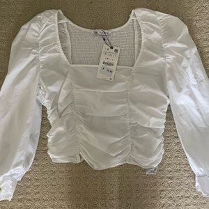 Zara white ruffled blouse
